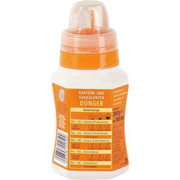 a white and orange bottle with a clear cap